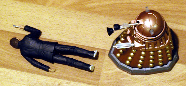 Dalek Vs. Dalek - Wayne looks down on The Doctor's body