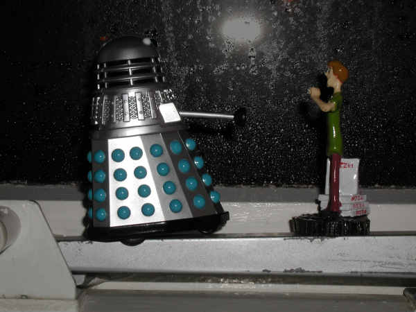 Mr. Dalek looks out of the window